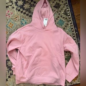 H&M Pink basic hoodie. Size medium. 60% cotton 40% polyester. NWT.